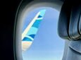 JetBlue wingtip as seen through cabin window
