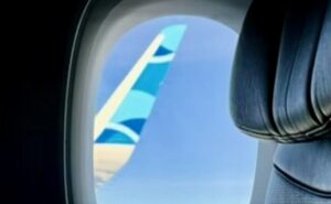 JetBlue wingtip as seen through cabin window