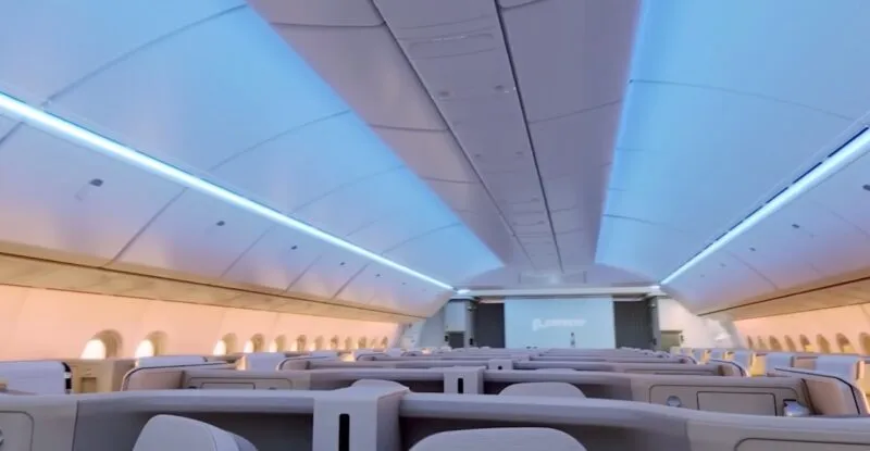 A wide cabin on this 777X widebody, made to look ever more spacious by removing the center overhead bin.