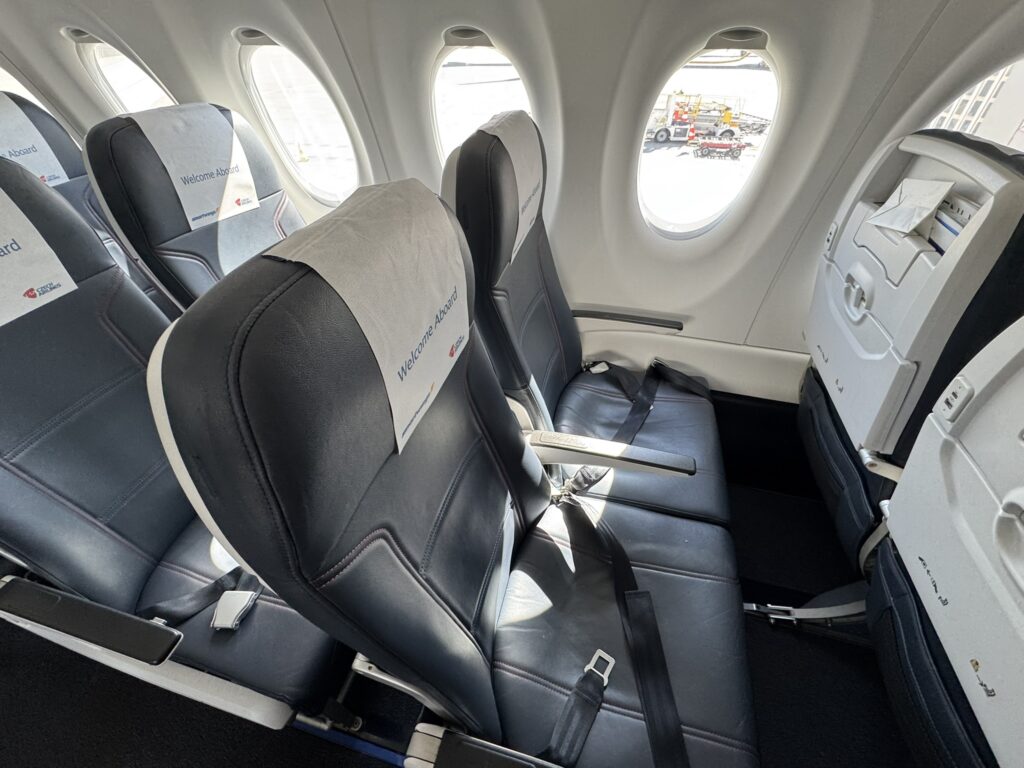 Cushy looking blue seats on board.