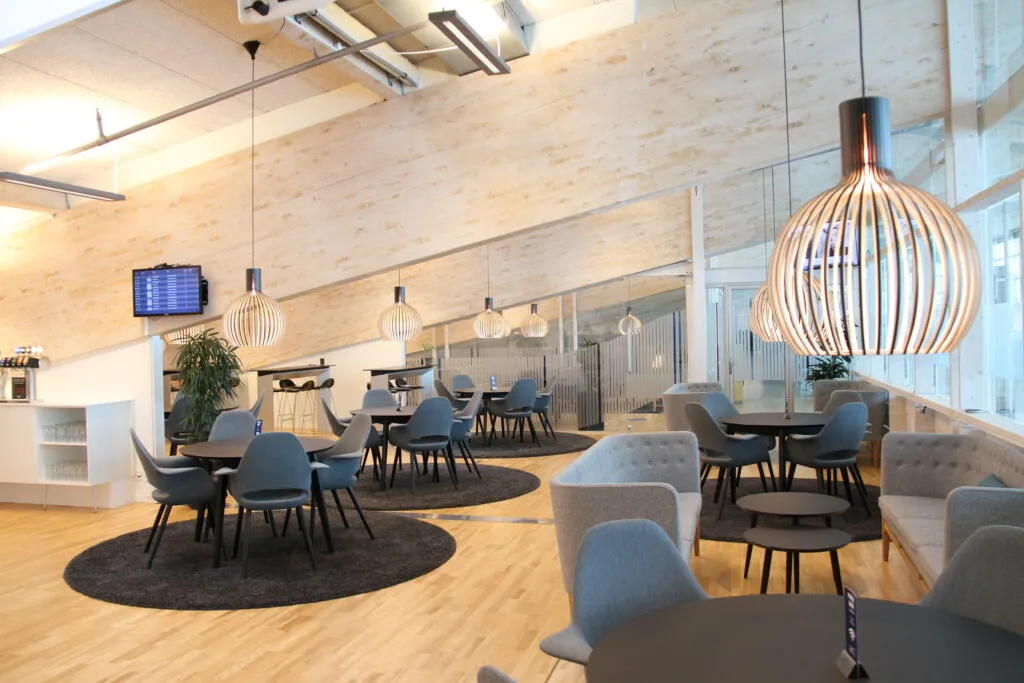 SAS AAL Lounge is a brightly lit space with various seating options