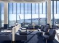 Large floor to ceiling windows line the wall of the Air France Business Lounge in Chicago Airport.