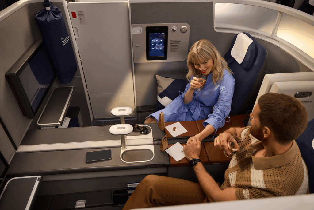 Lufthansa Allegris business class seat with passengers.