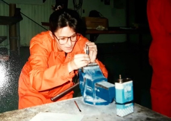 Denise Buklis working on an aircraft part. 