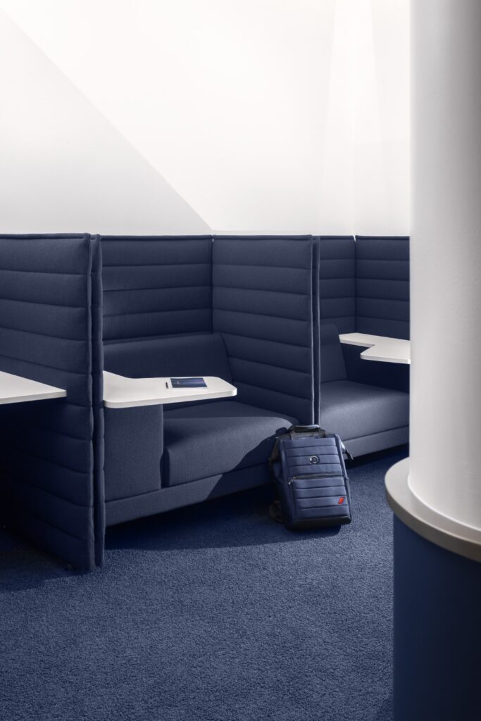 Private booths allow passengers to sit and focus on work and other things in solitude.