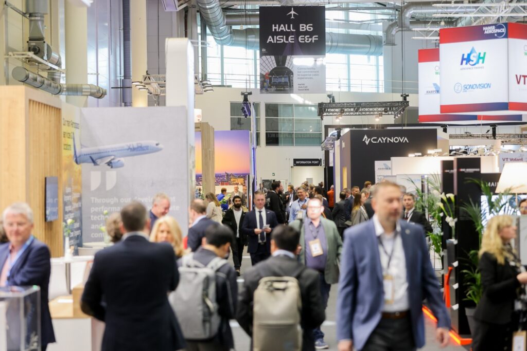 Industry execs walk the AIX show floor