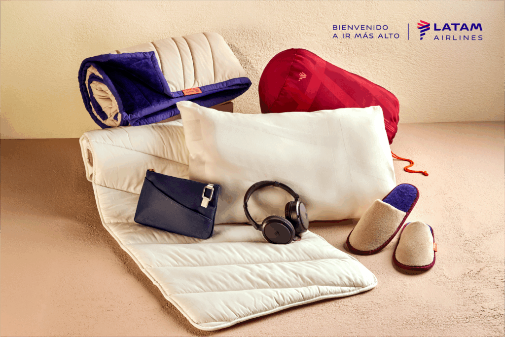 LATAM pillow, mattress pad, amenity kit, slippers and headphones are displayed here.