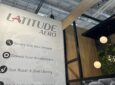 Latitude Aero signage at AIX 2024, touting the firm's seat and sidewall panel refurbishment services