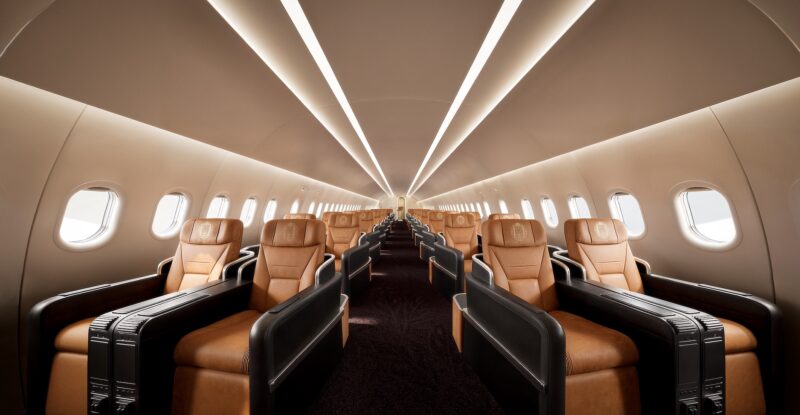 MAGAIR interior with burnt orange leather seats and dark furniture accents