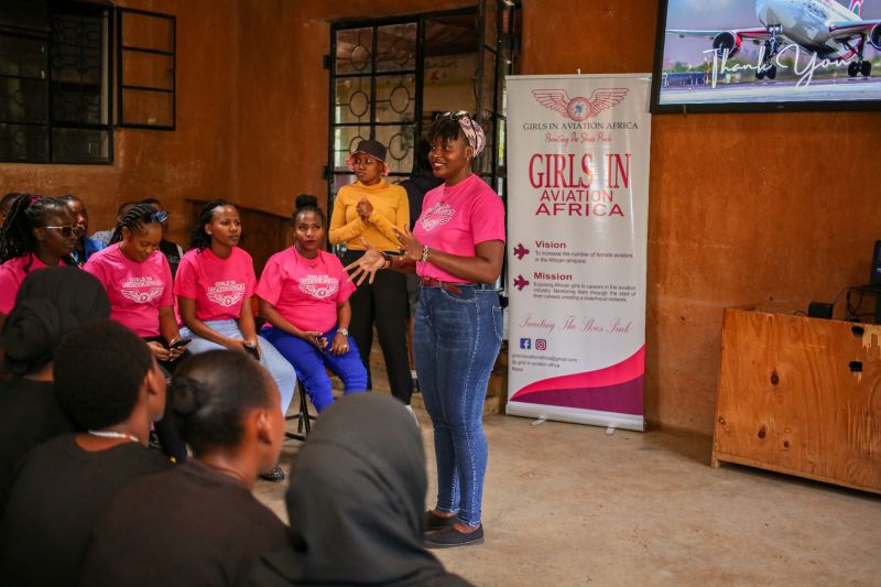 Maseka Kithinji speaking at an event for young girls.