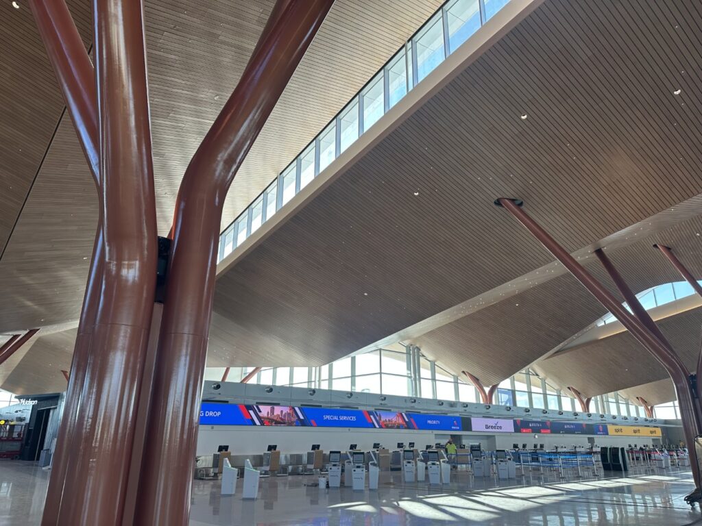 Metal tree-like columns support the roof