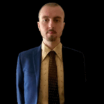 Sean Toohey posing with a black background
