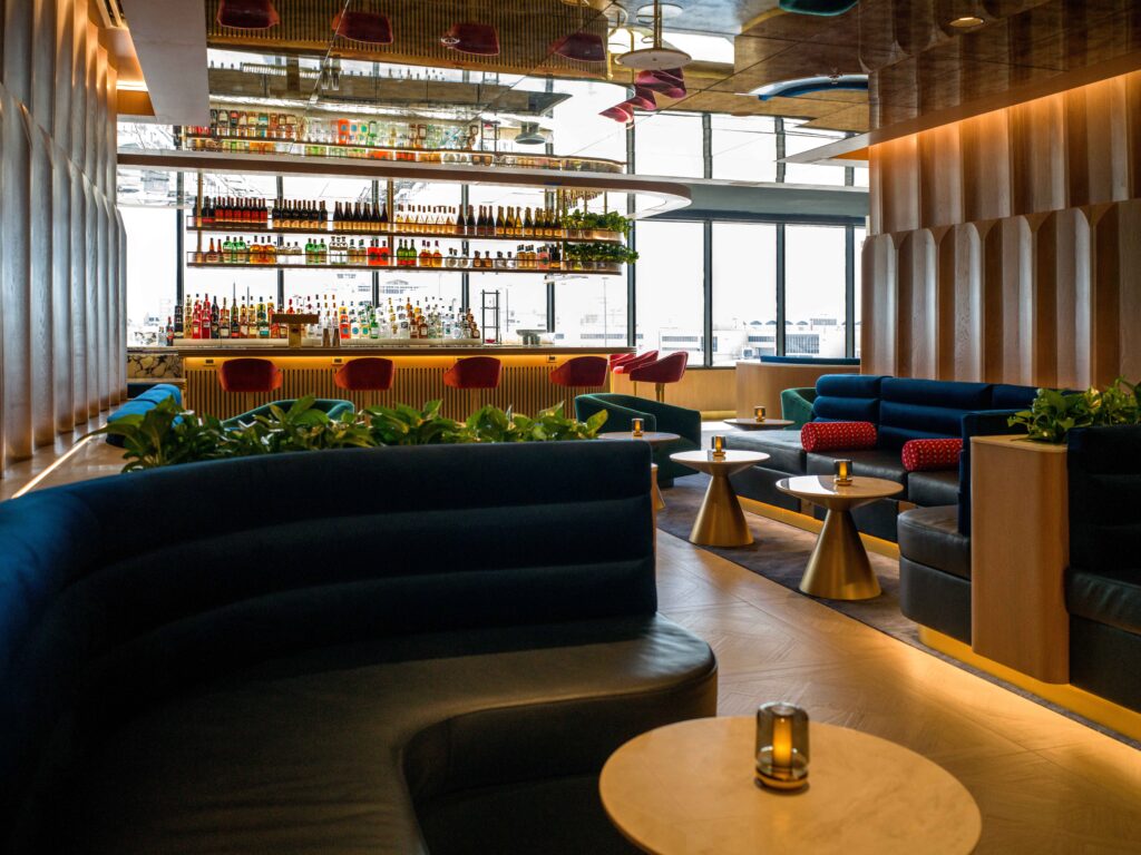 Central bar and seating in new Miami lounge