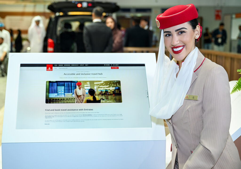 New 'Accessible & Inclusive Travel Hub' on Emirates.com is displayed on a large screen at the trade show.