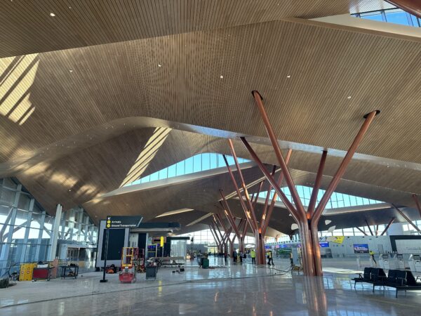 Light floods in from the ceiling and windows.