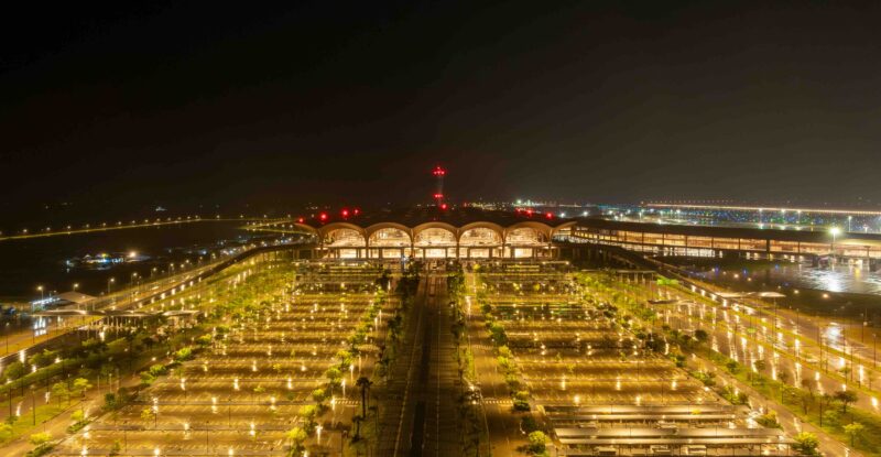 A drone shot of Techo International Airport at night.