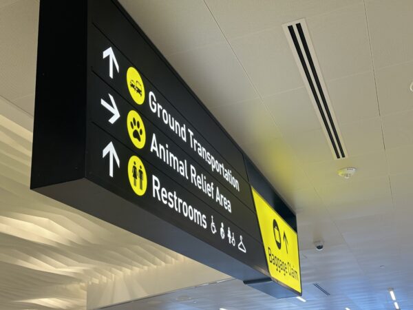 Prominent signage in black, gold and white