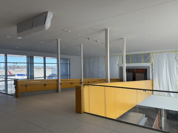 Bridge leading to the tunnel to the airside terminal.