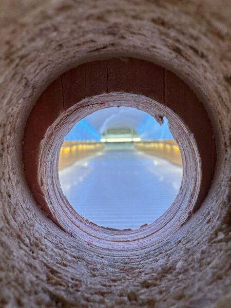 Looking through a hole to see the tunnel