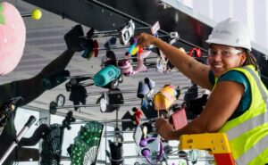 Alisha Wormsley during installation of her art at the new PIT terminal