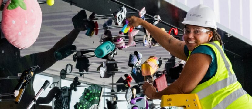 Alisha Wormsley during installation of her art at the new PIT terminal