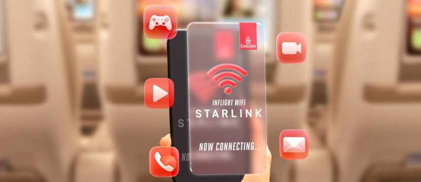 A passenger holds up their device in front of the Emirates IFE. The device says Starlink