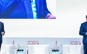 SITA and Amadeus executives speaking at an event