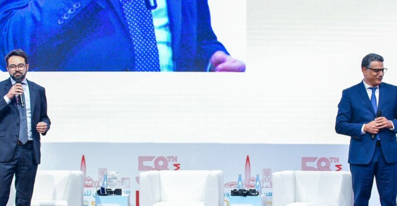 SITA and Amadeus executives speaking at an event