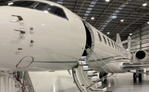 Inside the Farnborough Airport hangar the Global 8000 is displayed for attendees.