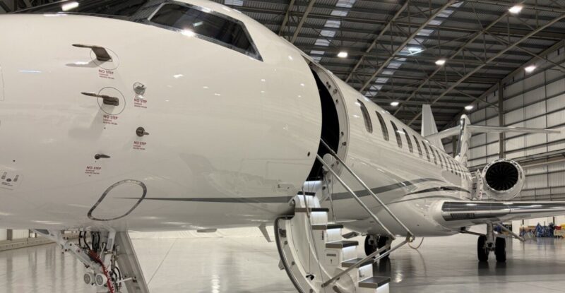 Inside the Farnborough Airport hangar the Global 8000 is displayed for attendees.