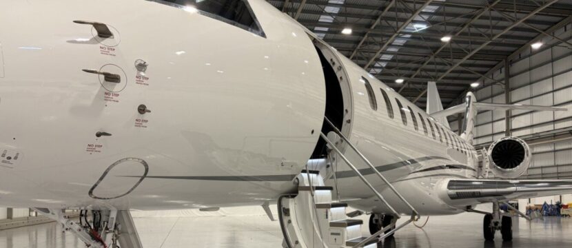 Inside the Farnborough Airport hangar the Global 8000 is displayed for attendees.