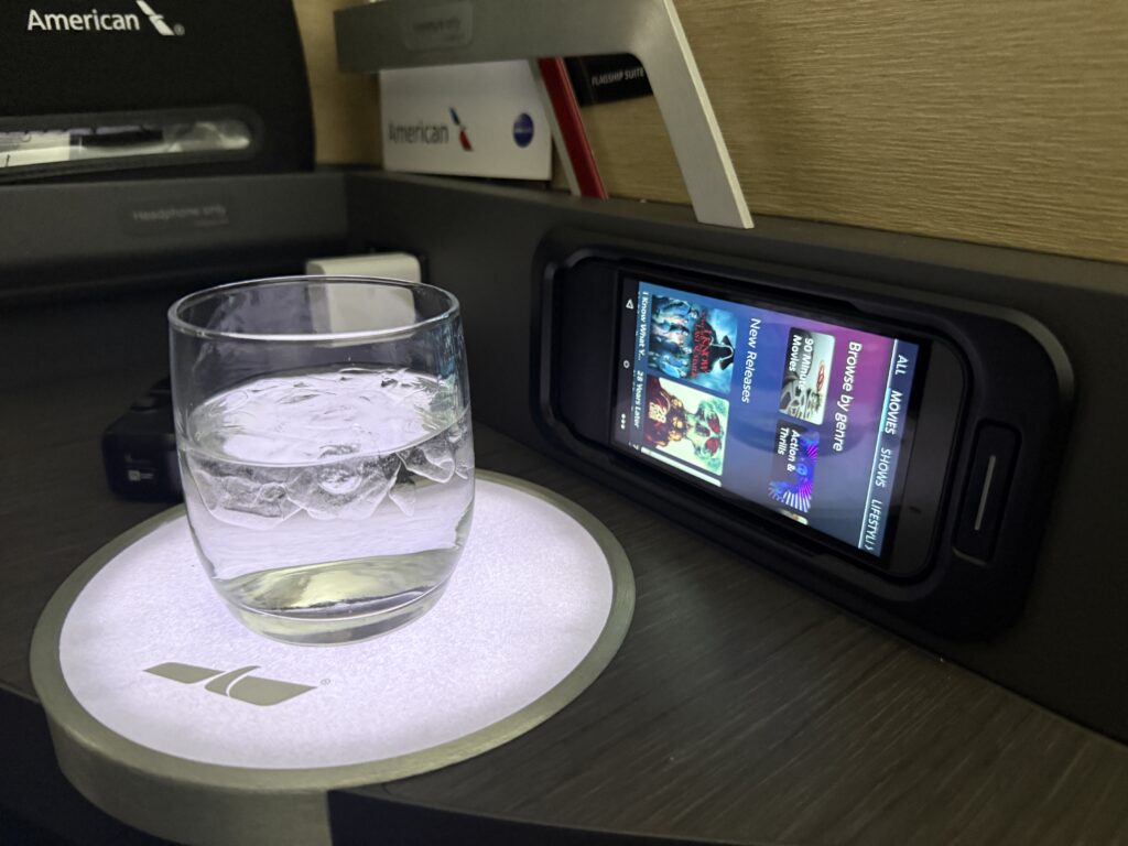 A glass of water sits on the suite's cocktail table. 