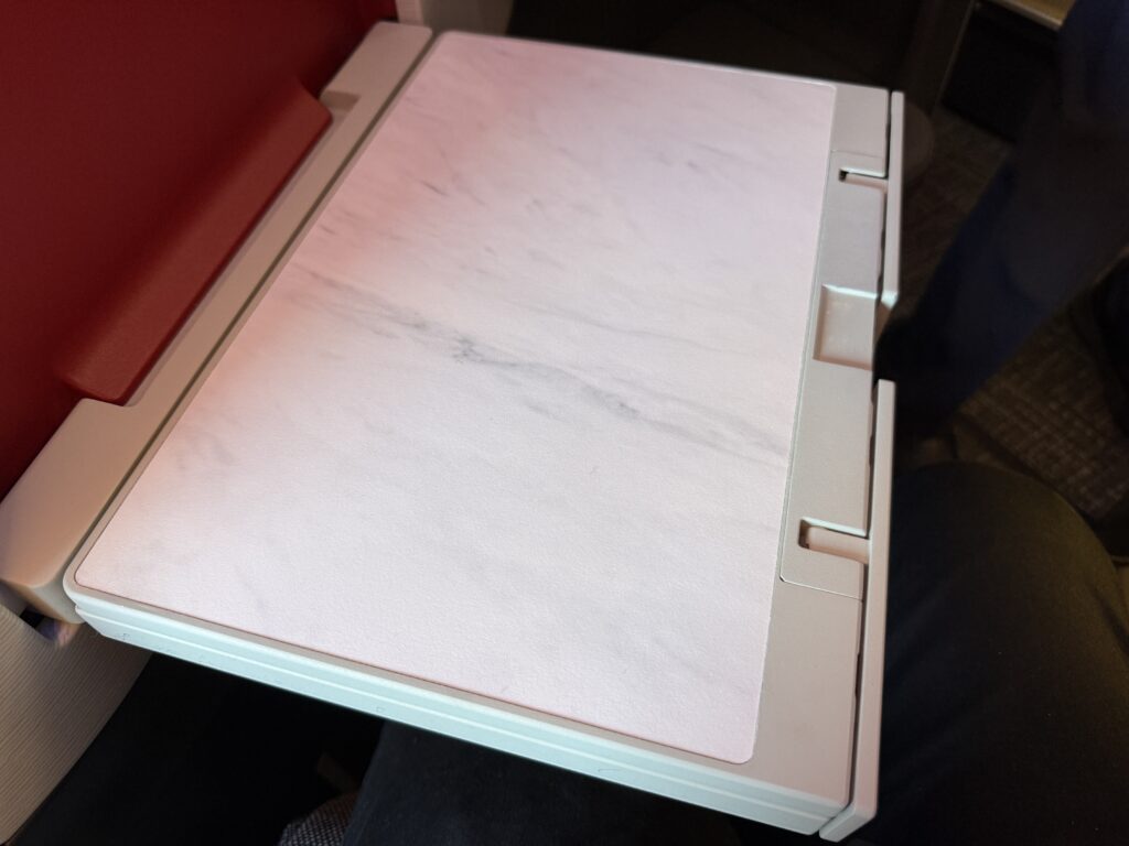 The tray table is seen here folded in half. 