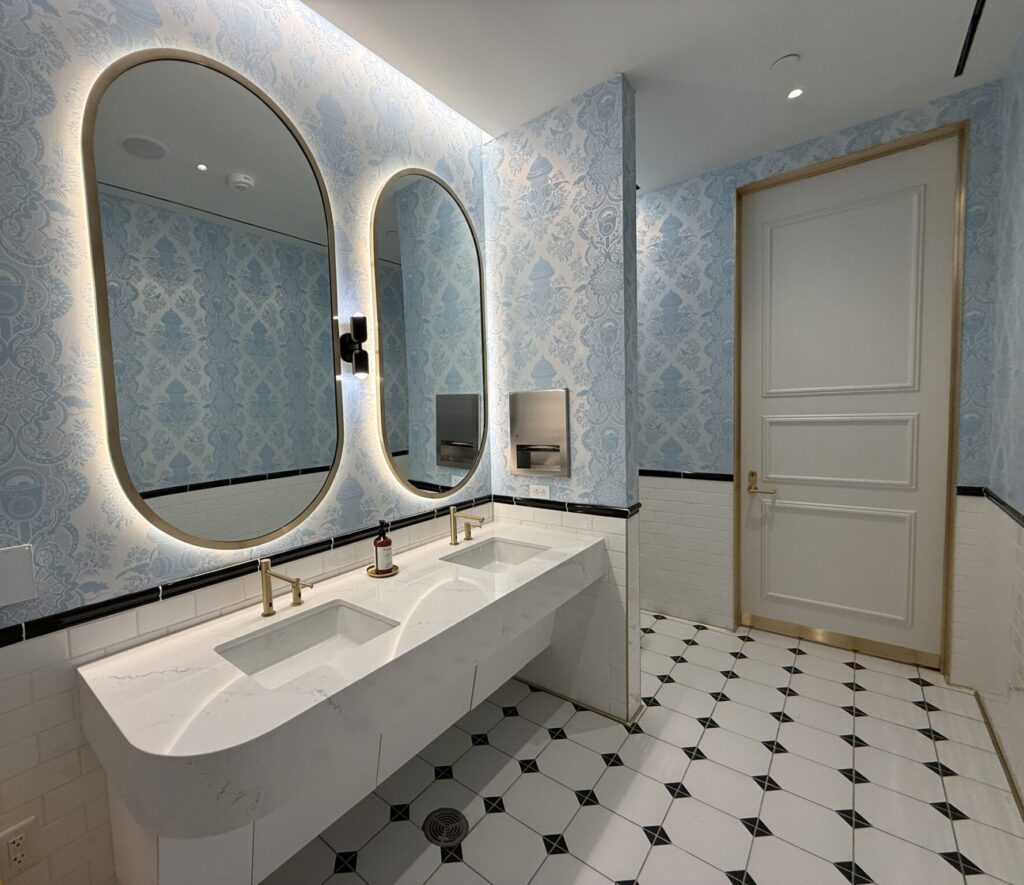 The lounge bathroom is equipped with mirrors that mimic aircraft windows.