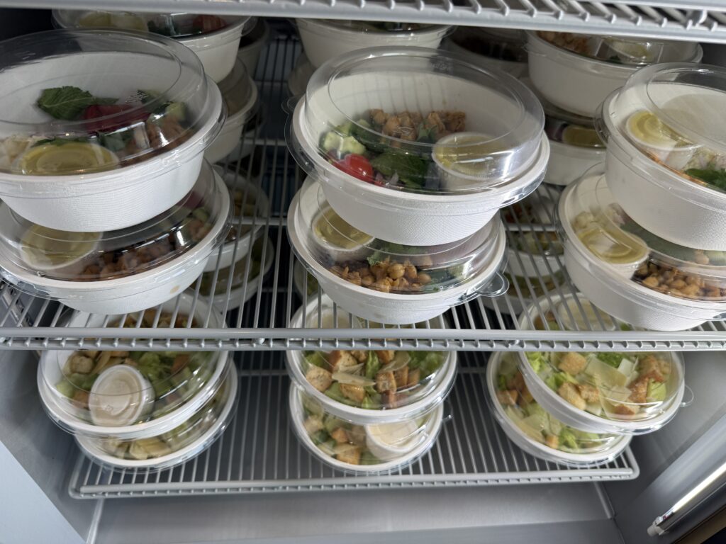 Various salads on offer for passengers to grab and go.