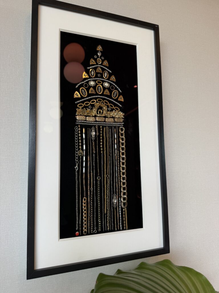 The Chrysler Building is created from jewelry and displayed as art in the upstairs level of the lounge.