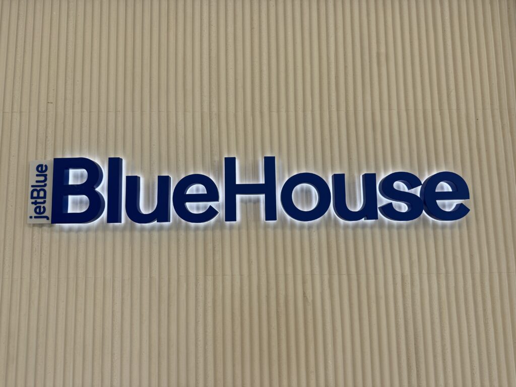 BlueHouse letter signage on the wall of the new lounge.