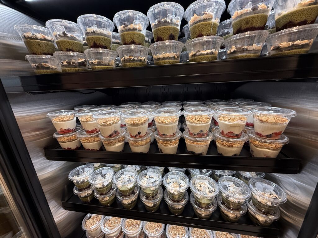 Various deserts are lined up for passengers to enjoy.