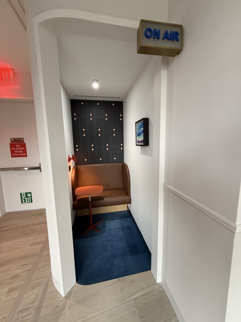 Bluehouse phone booth is tucked away in the upstairs level of the lounge.