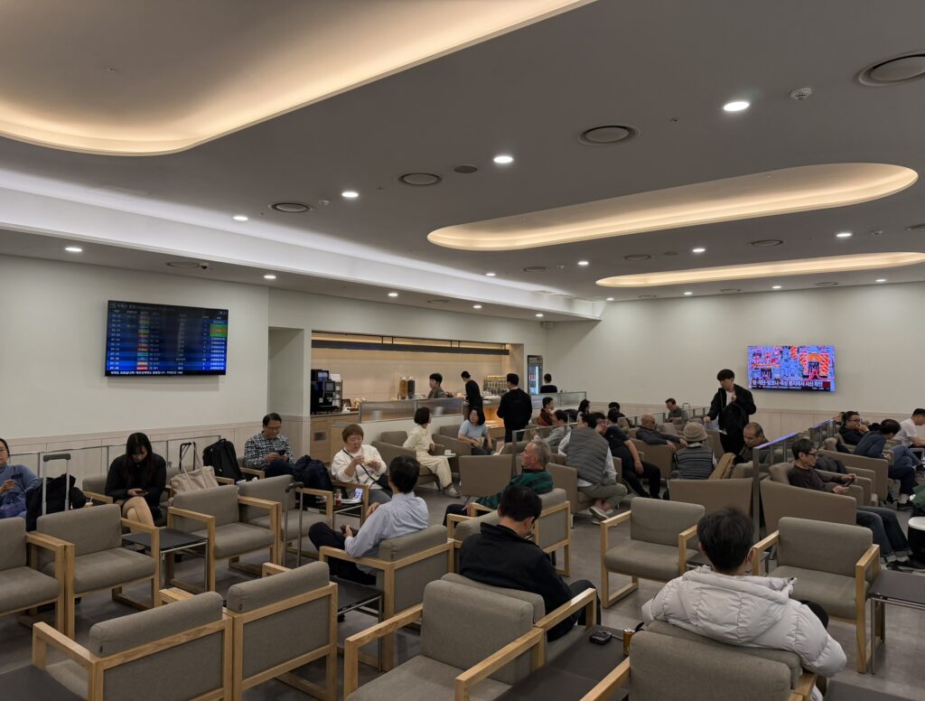 Korean Air's lounge is a room with basic chairs, no windows and lots of beige.