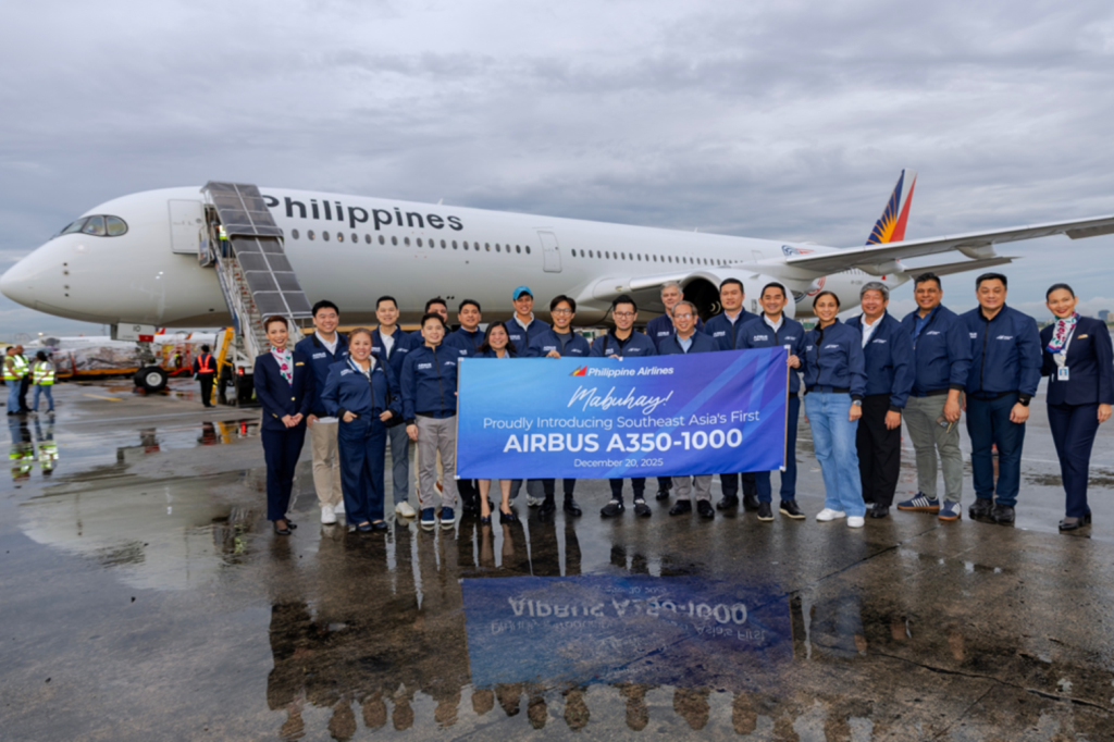 Philippine Airlines employees celebrate the first A350-1000
