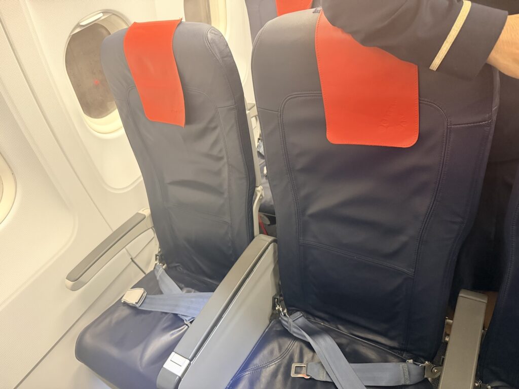 Two blue seats with antimacassars are seen here on the Brussels Airlines' A320.