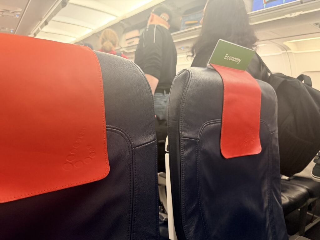 Two blue seats with antimacassars are seen here on the Brussels Airlines' A320. These seats had a small green tag indicating Eurobusiness class.
