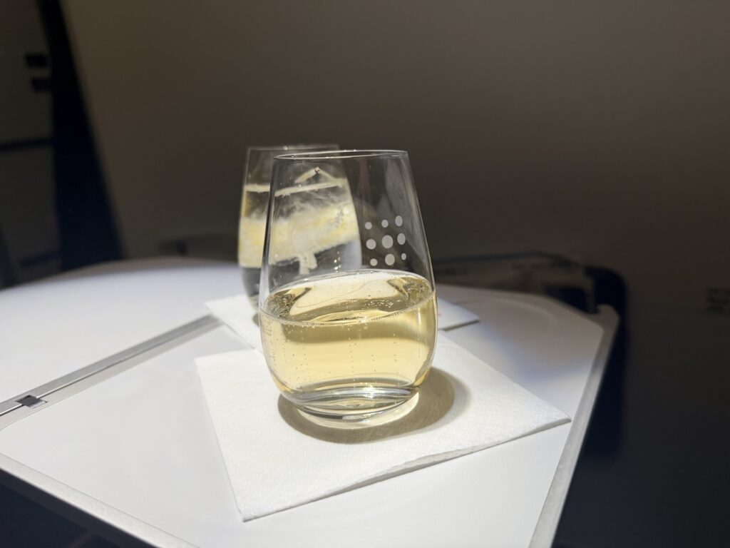 Cremant is served here in a Brussels Airlines glass.