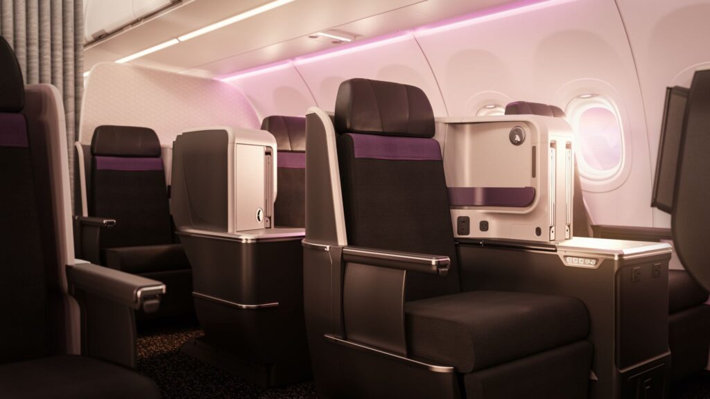 Thompson Aero Seating’s Vantage seats in dark grey with purple details. 