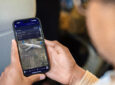 United passenger uses the carrier's new Cloud Map on their device, as supported by FlightPath#D