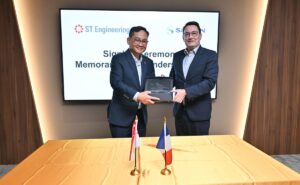 Mervyn Tan, President, Defence & Public Security, ST Engineering (left) and Alexandre Ziegler, Executive Vice President, GBU Defense, Safran Electronics & Defense (right) marking the completion of the MOU signing with the presentation of a commemorative plaque.
