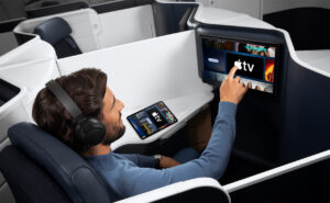 An Air France passenger is using Apple TV on the IFE system.