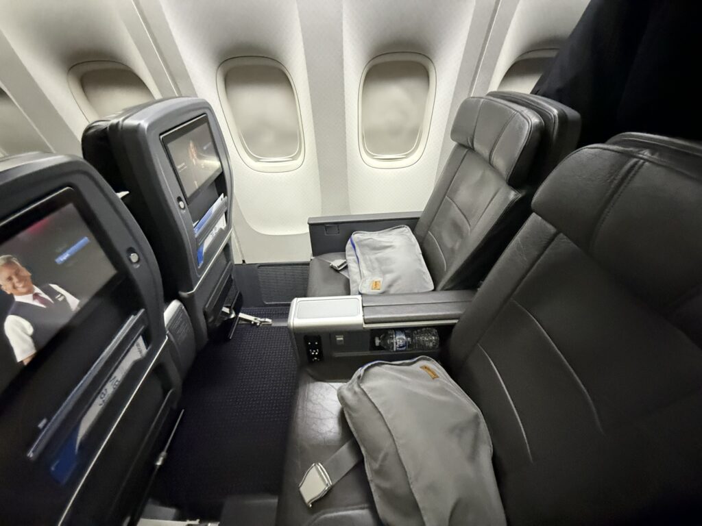 Blankets sit on the Premium Economy class seats.