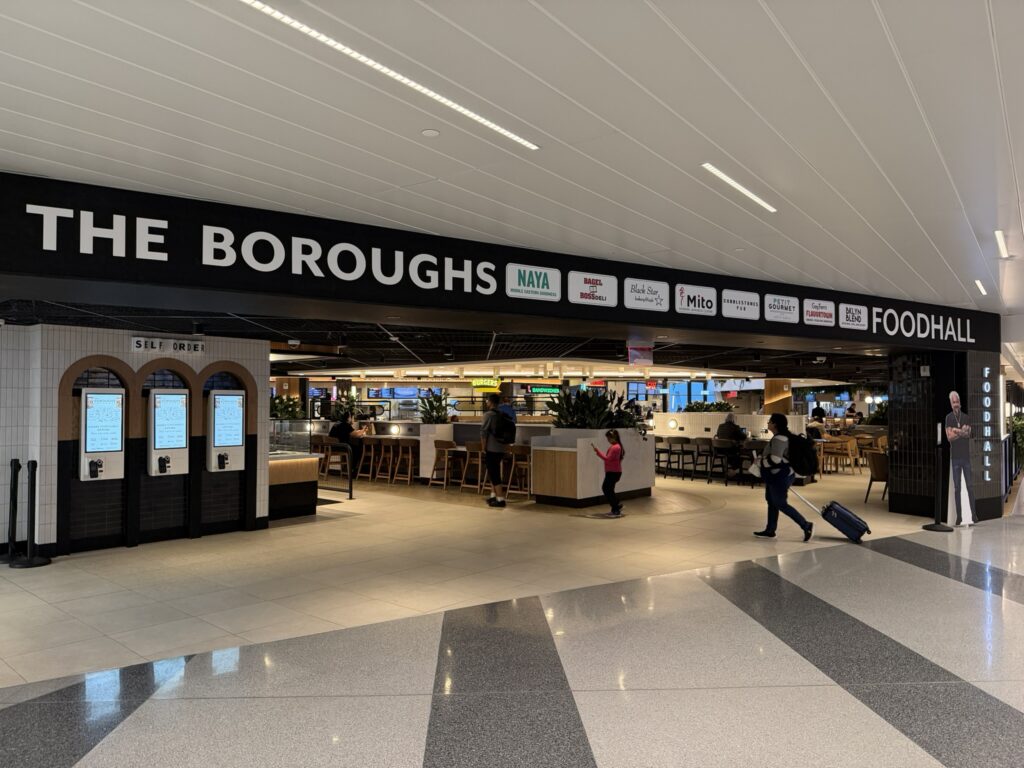 A large food hall located in JFK Terminal 8 is called The Boroughs